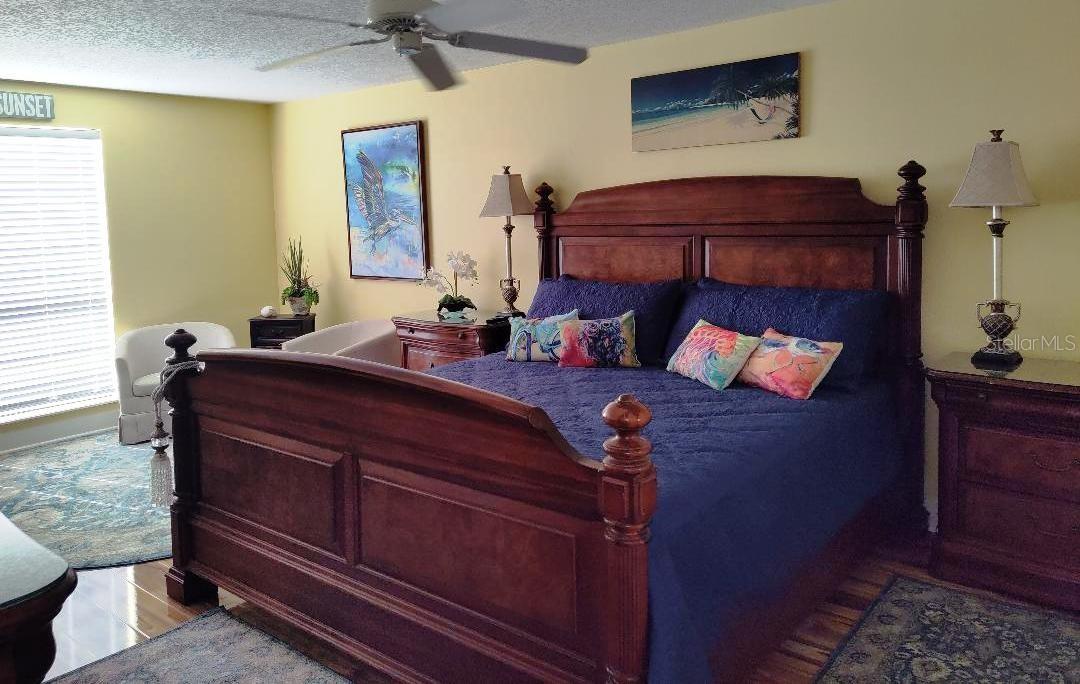 The owner's suite - even vacationers fall in love again - sitting area, walk-in closet and private new bathroom