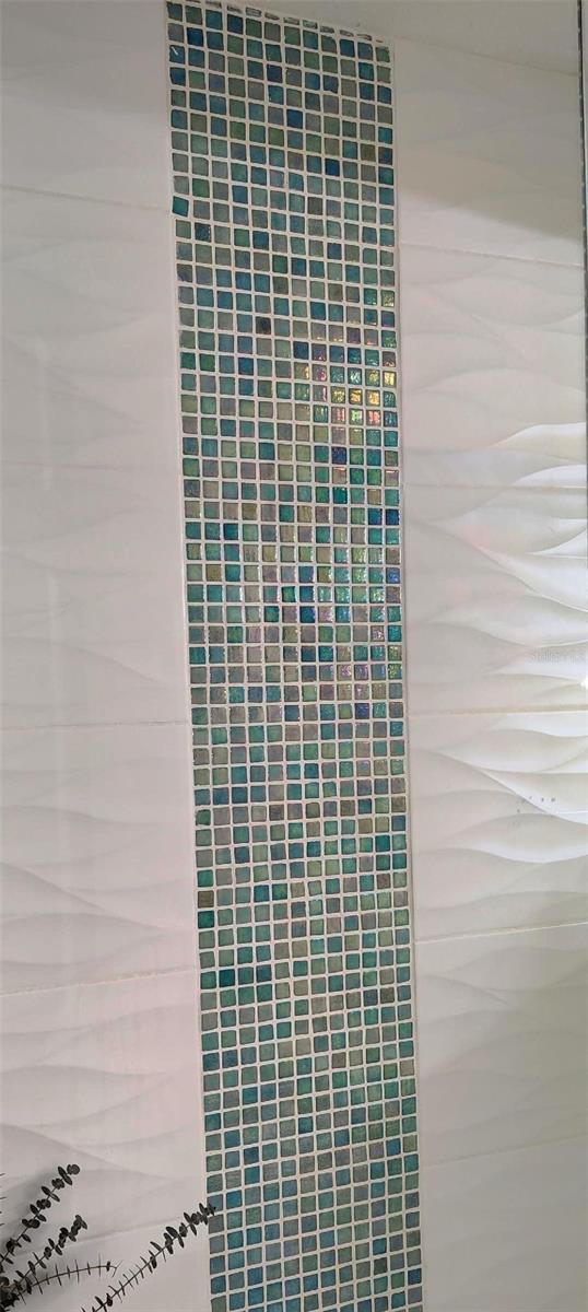 Same hand cut Grecian Sea tile as the entire pool