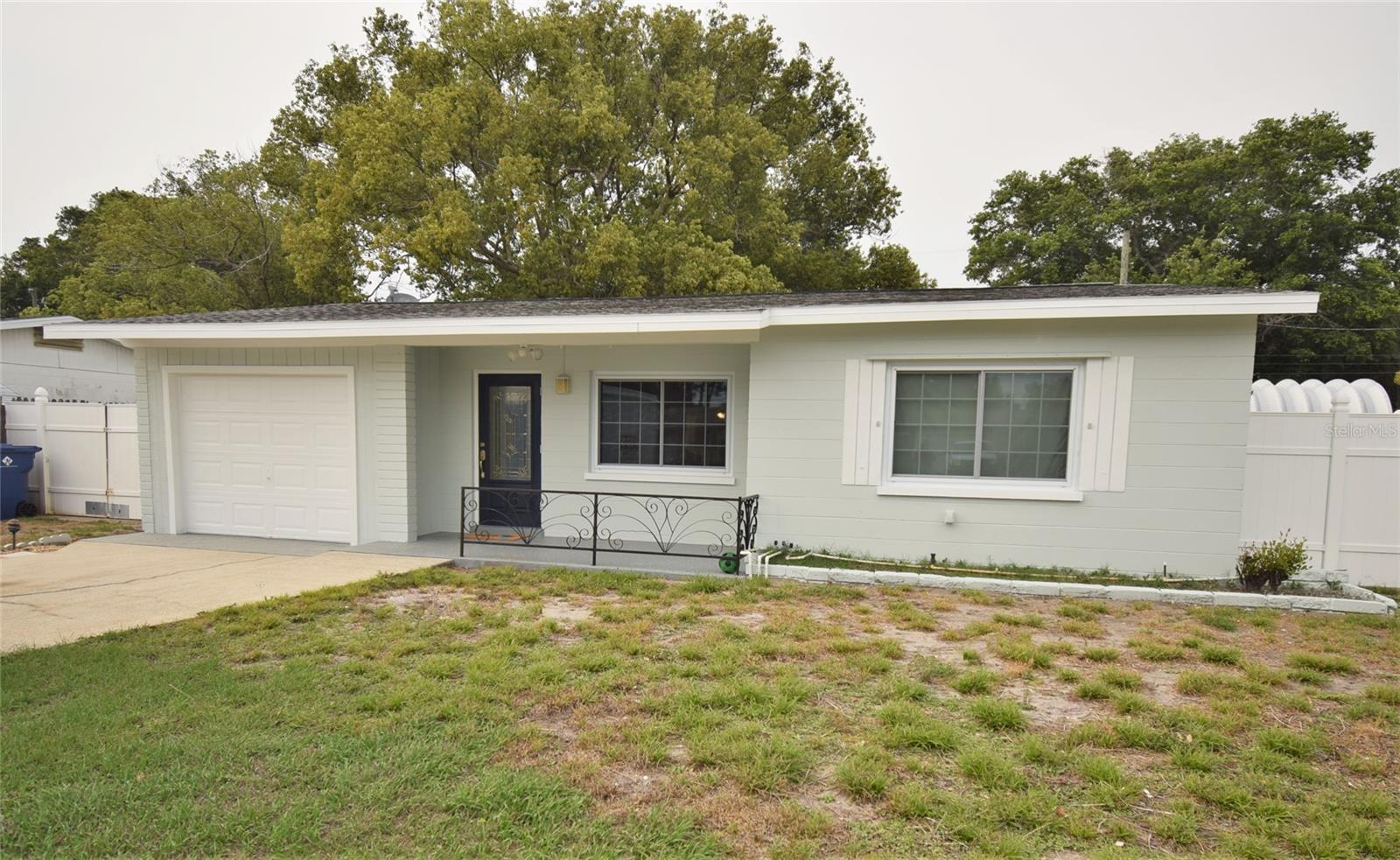 This home boasts a freshly painted exterior, new windows, and a new roof! New ac too!