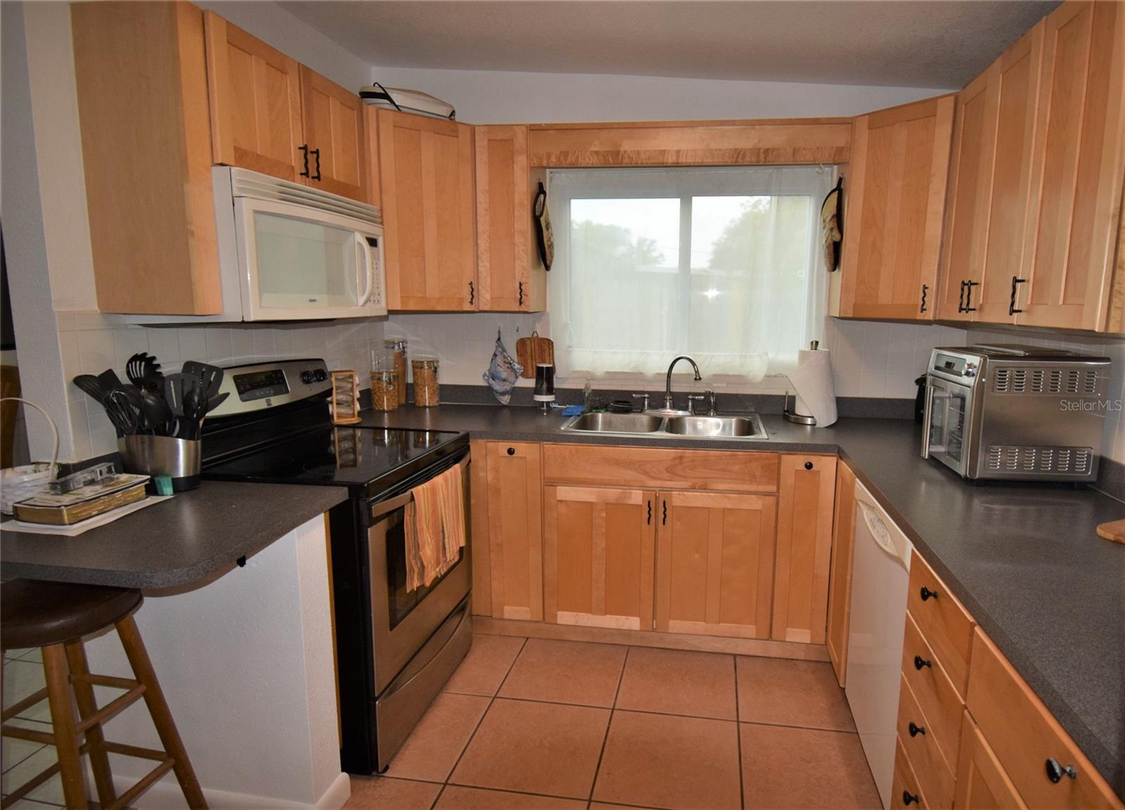 This kitchen offers plenty of counter space!
