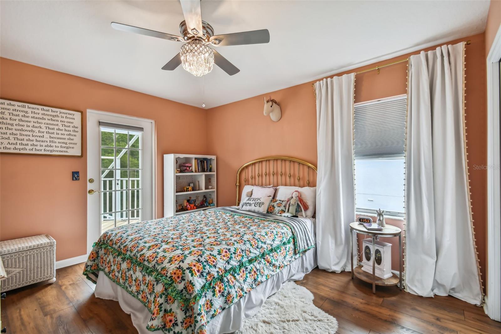 second bedroom with back deck access