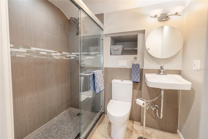 The third bedroom with an ensuite bath with shower