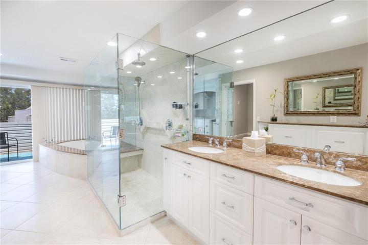 You will love the owner's spacious bathroom with double sinks and marble counters