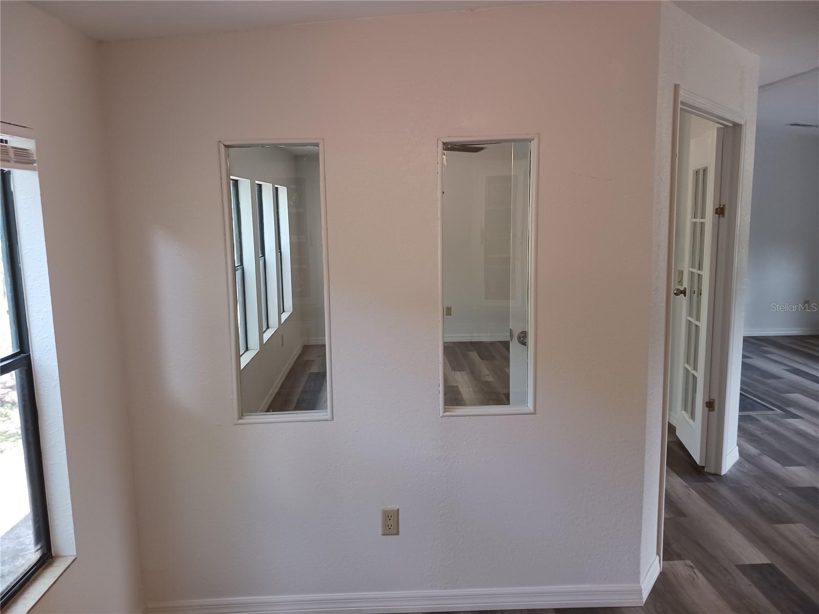 Eat in dining area with view into bonus room.
