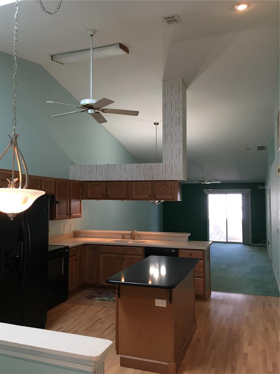 Kitchen view to dining/living area