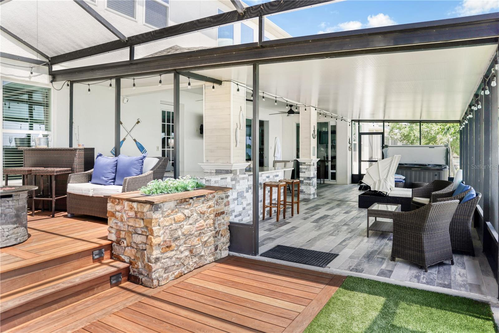 Back porch with Outdoor Kitchen &amp; Grill and Spa