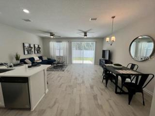 Open Floor Plan with Sliding Doors to Back Patio (stock photo)