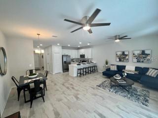 Open Floor Plan Living Room/Dining Room/Kitchen (stock photo)
