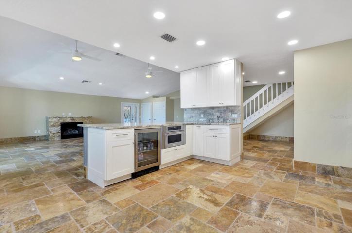 KITCHEN OVERLOOKS GREAT ROOM