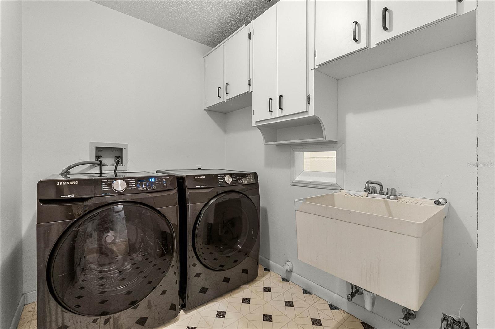Laundry room with laundry chute from the Master Bedroom