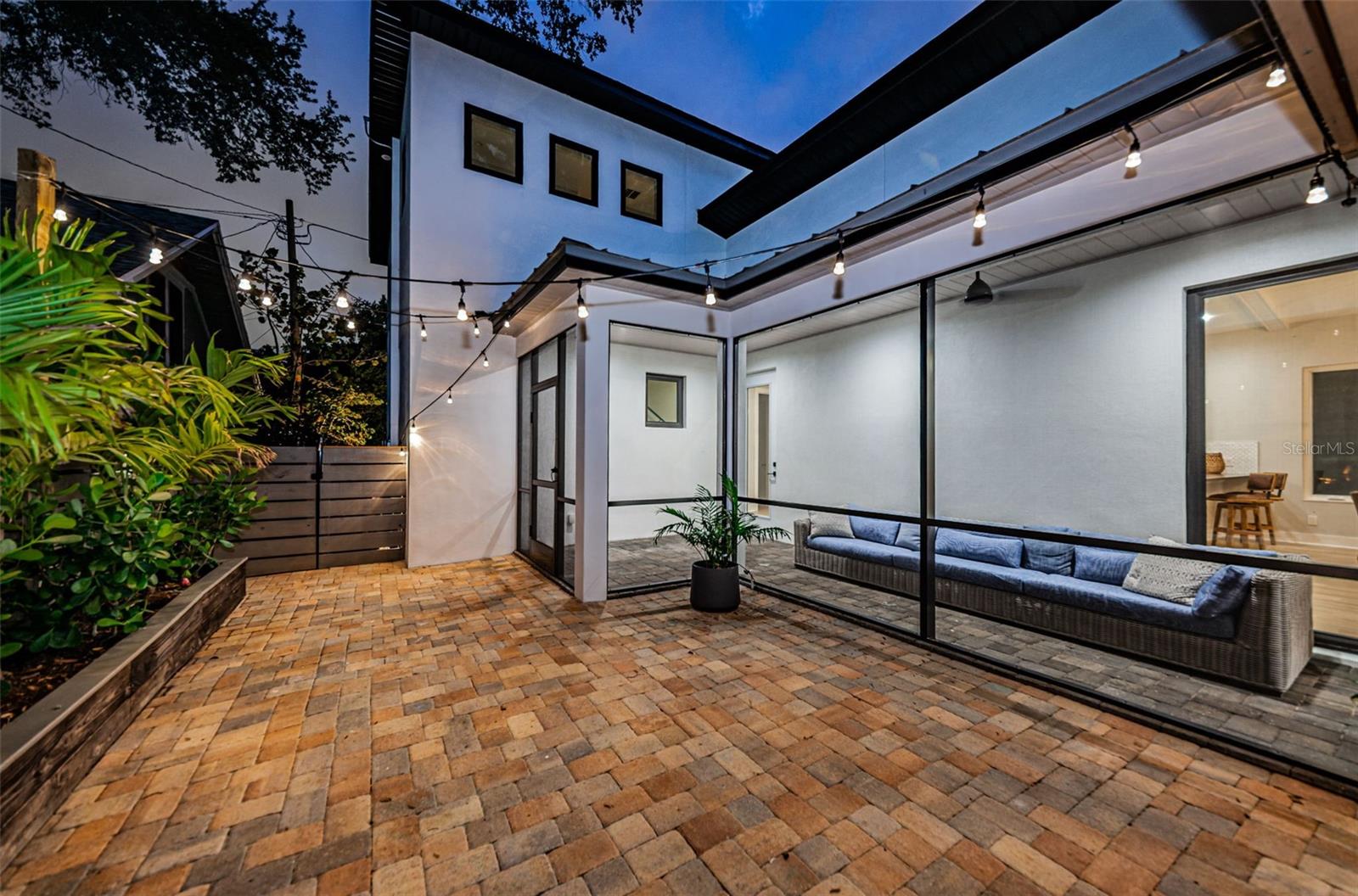 Throughout the patio, custom irrrigation drip lines are installed for potted plants and gardens.