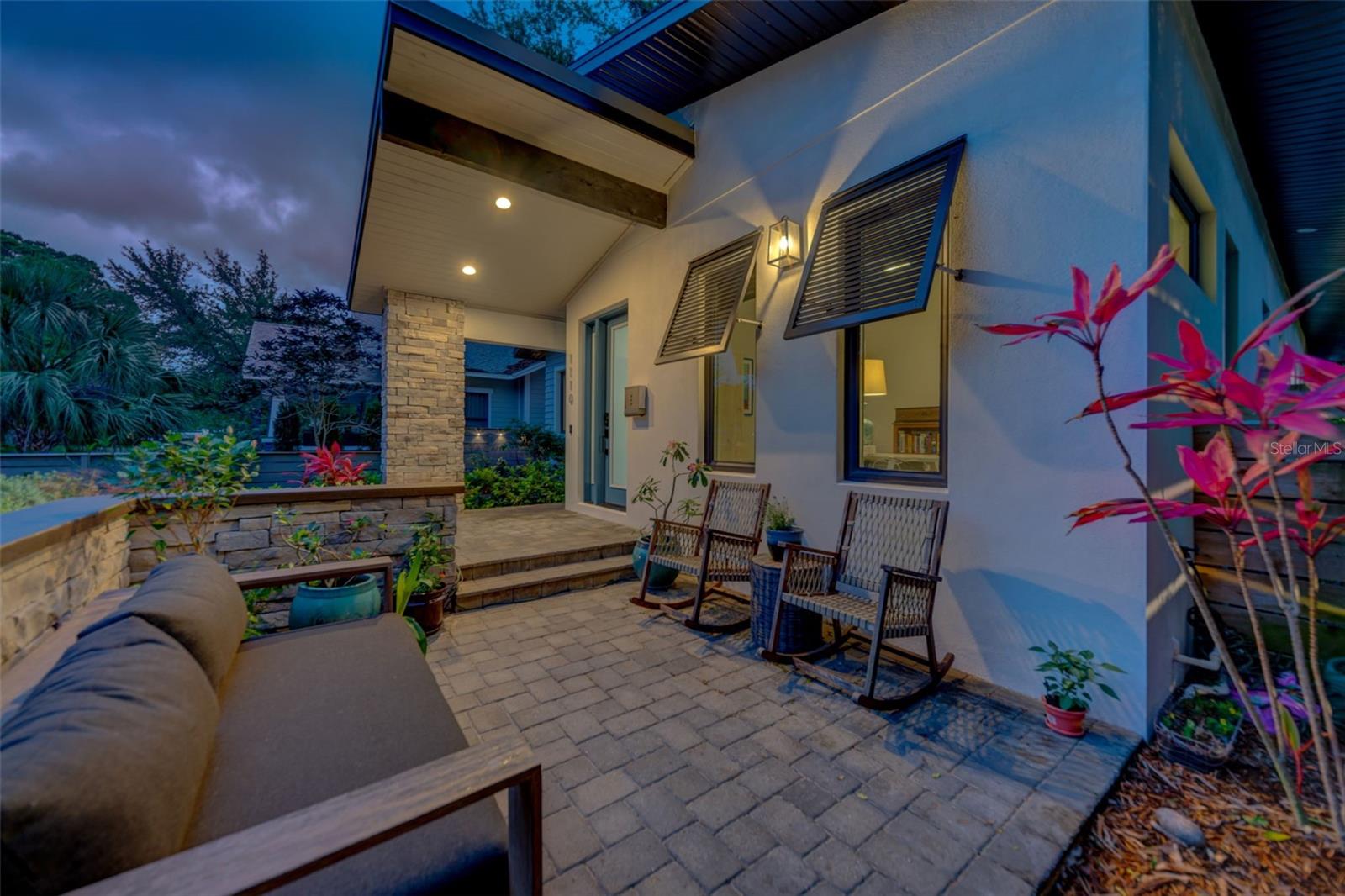 Sit among the orchids and garden boxes.