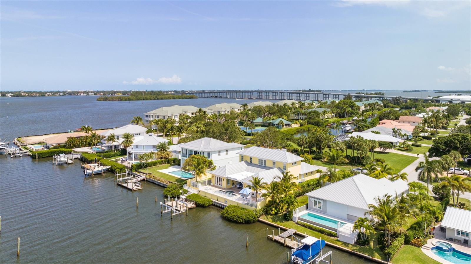 Just a short boat ride to the Indian River. 2016 seawall, dock and 10,000 lb.lift. Deep water canal to accommodate your vessel.