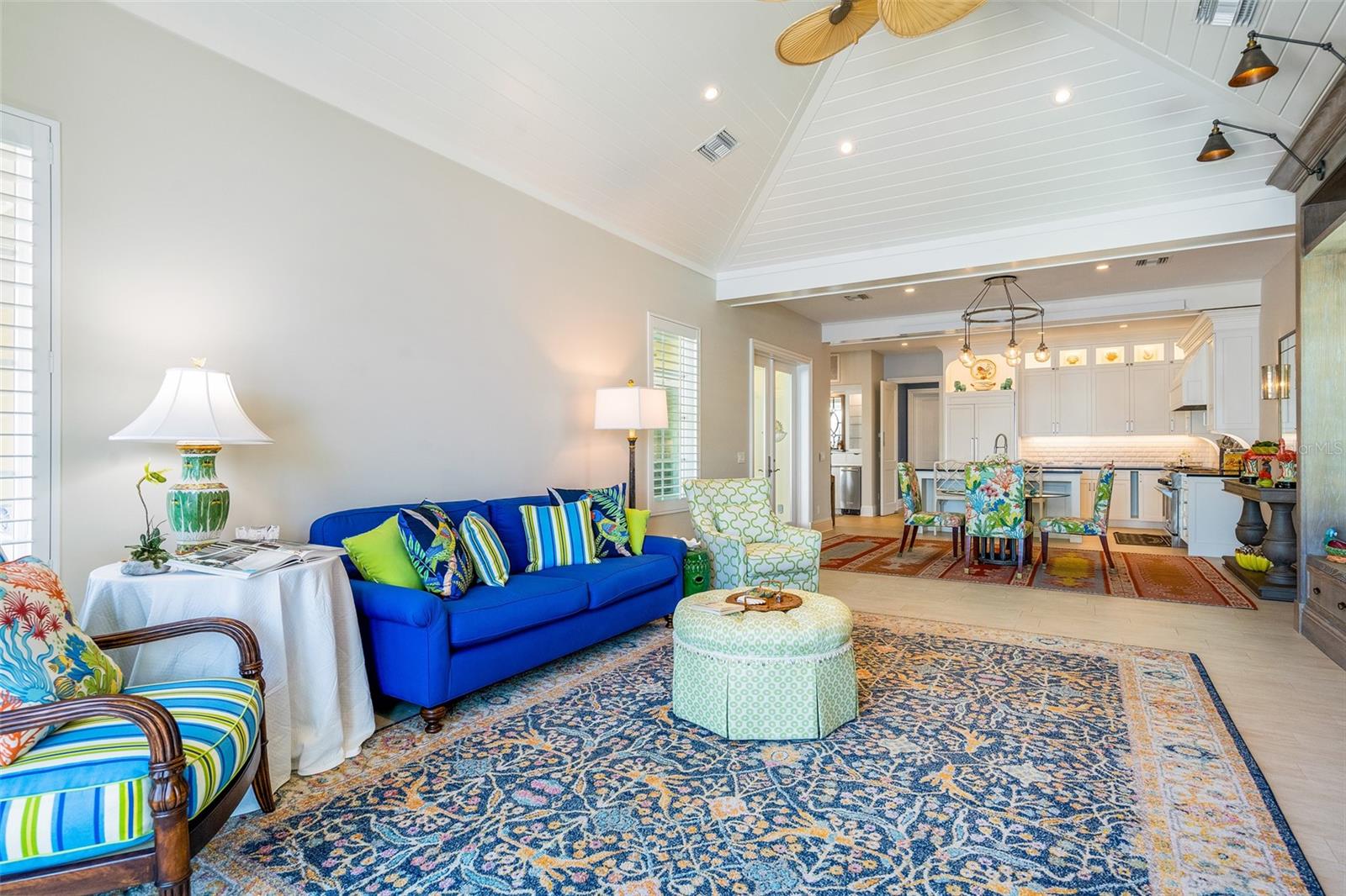 Expansive gathering area carrying the wood inspired tile throughout.