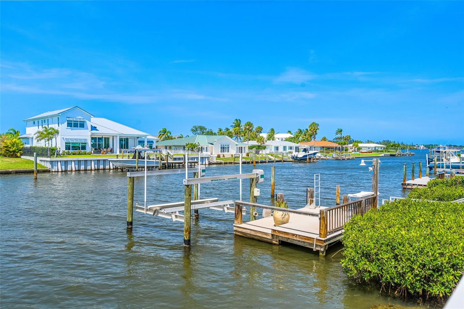 10,000lb. Boat lift. Built in 2016 and new motors in 2020). Dock built in 2016. Complete with cleaning station, water, electric, a ladder to get in and out for a swim.