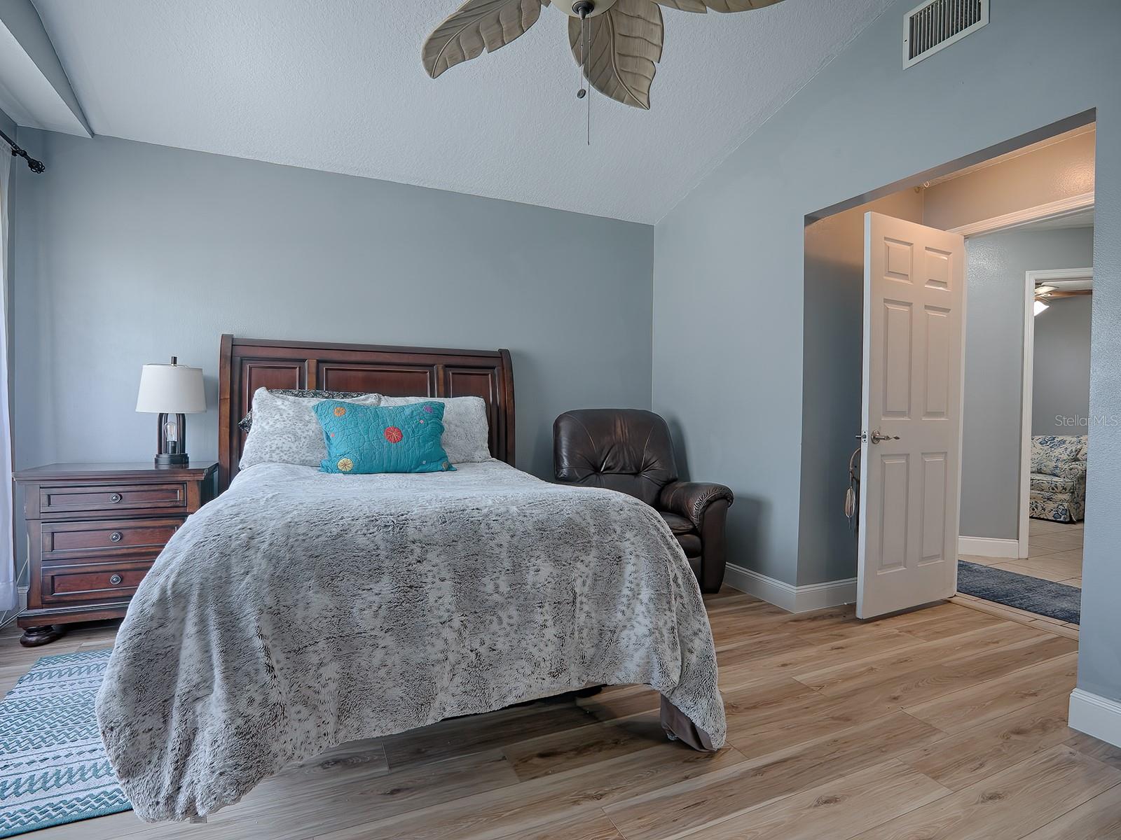 MASTER BEDROOM WITH NEW FLOORING