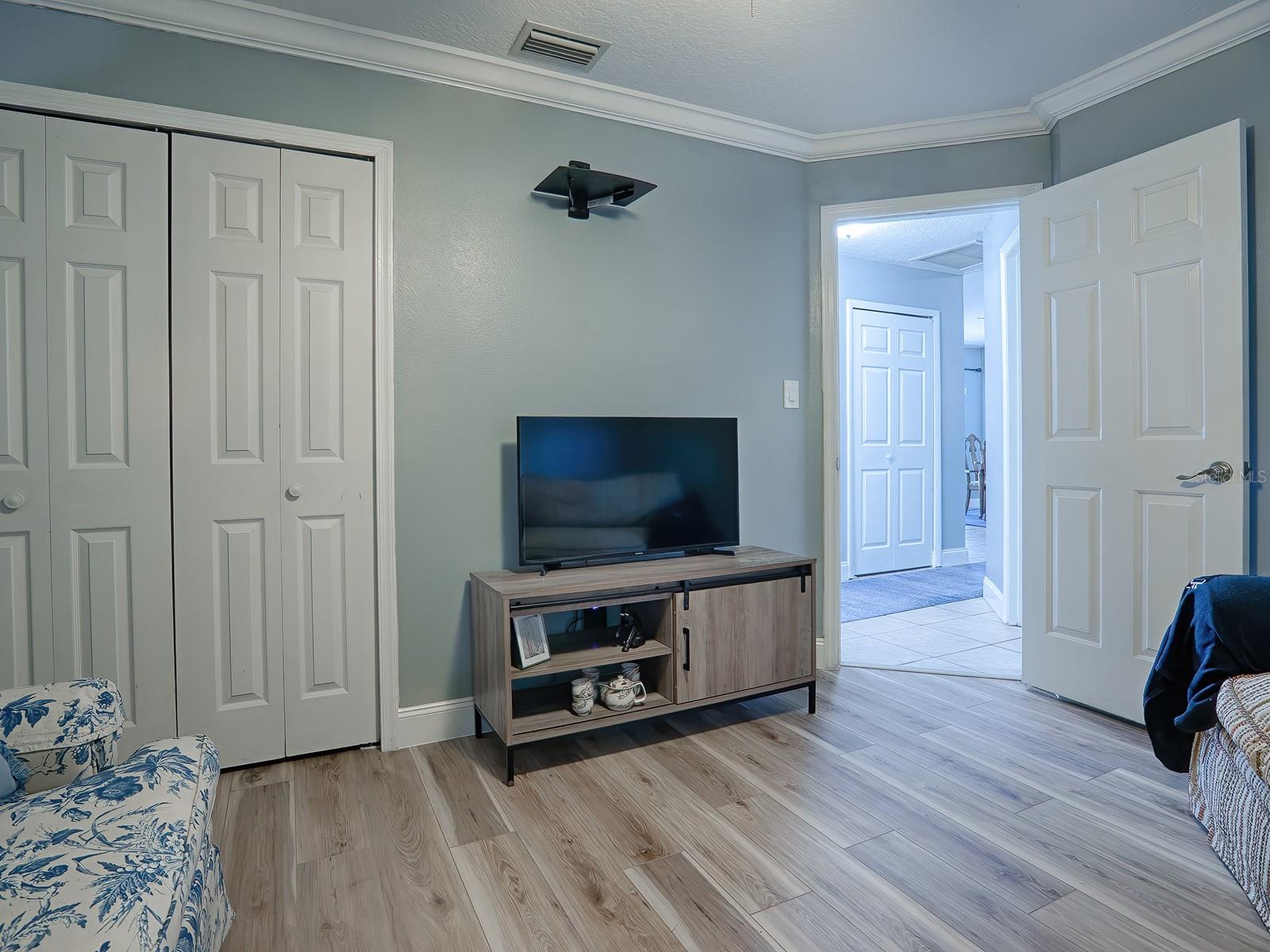 GUEST BEDROOM WITH NEW FLOORING