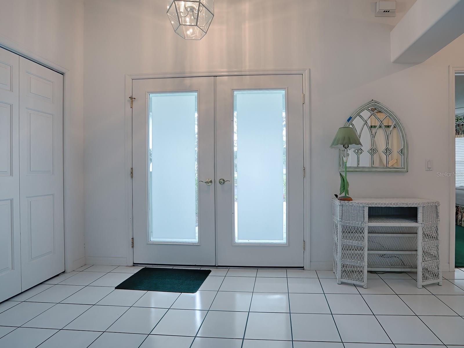 DOUBLE-DOOR ENTRY INTO YOUR FOYER WITH LARGE COAT CLOSET!