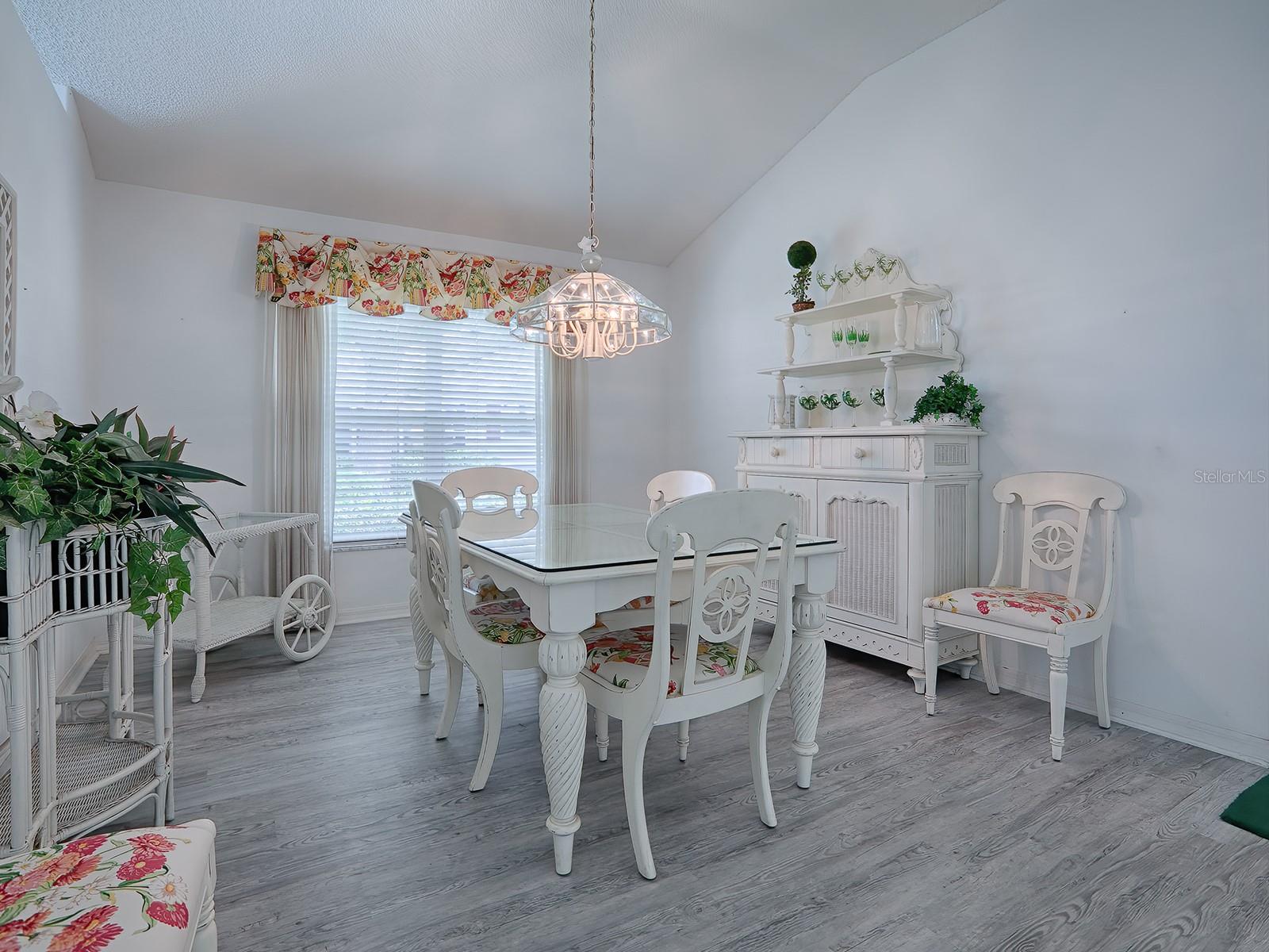DINING ROOM FOR MORE FORMAL ENTERTAINING.  QUITE OFTEN WE SEE THIS ROOM USED AS A DEN/OFFICE BY CLOSING WITH FRENCH DOORS .