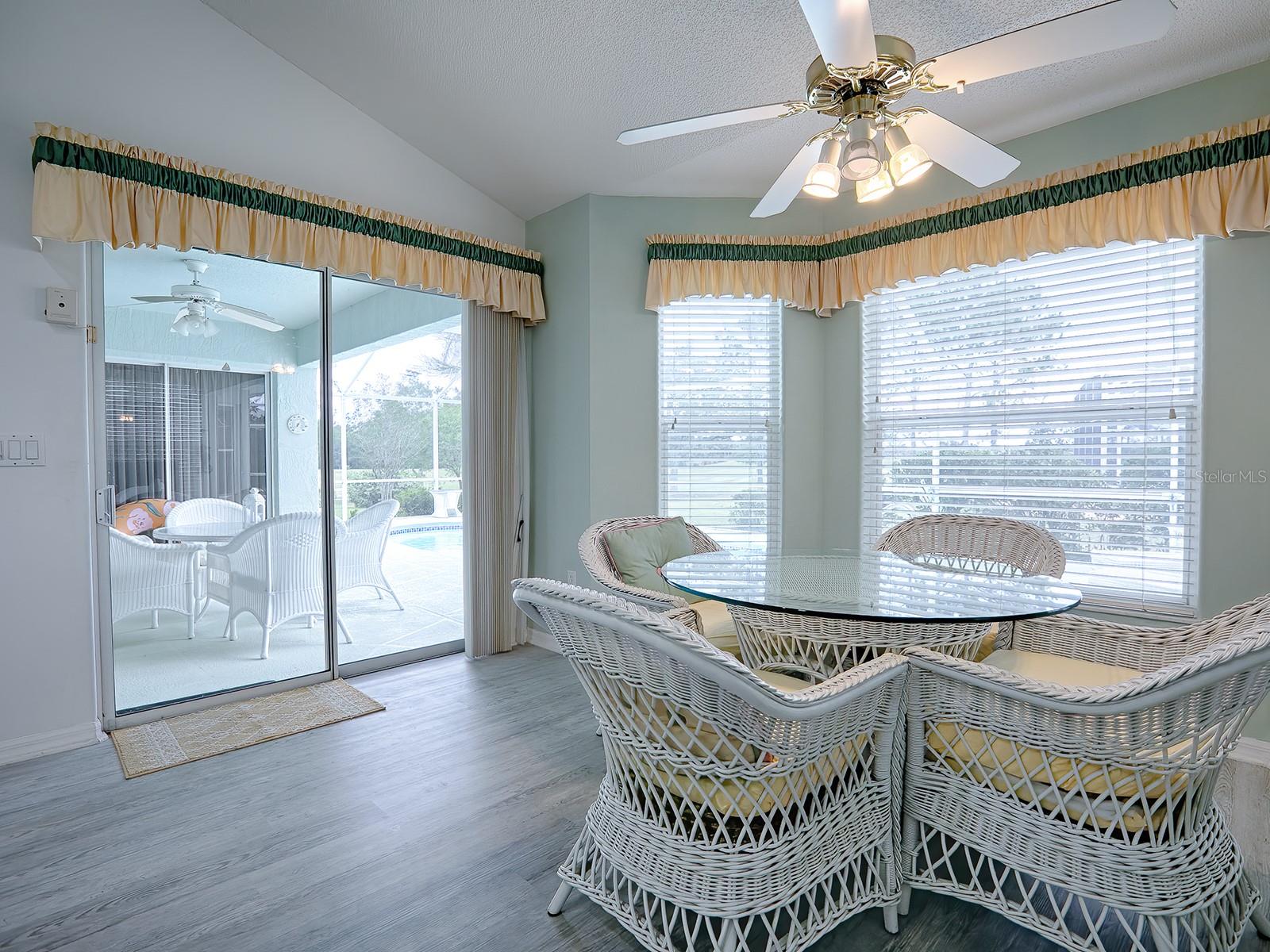THERE ARE GLASS SLIDING DOORS THAT LEAD TO THE LANAI AND POOL AREA FROM THE KITCHEN, LIVING ROOM, AND MASTER BEDROOM.