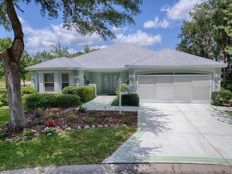 BOND PAID AND NEW ROOF ON THIS LOVELY "GRAND FICUS" DESIGNER WITH GOLF COURSE VIEW AND POOL!