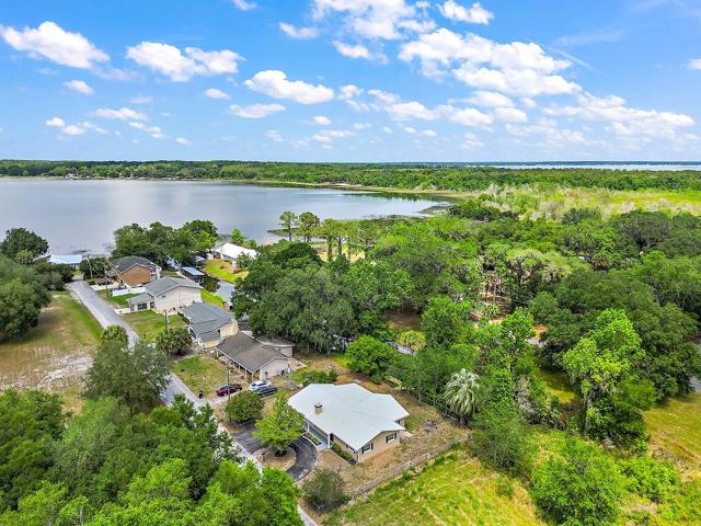 Access Little Lake Weir through the canal behind the home.