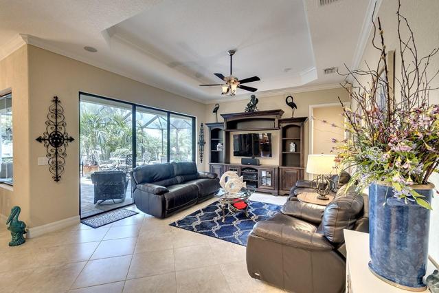 Spacious Great Room with Sliding Glass Doors Leading to Lanai