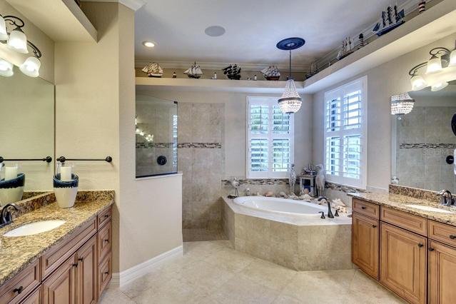 En-Suite Bath with Dual Sinks, Tiled Walk-in Shower, and Soaking Tub