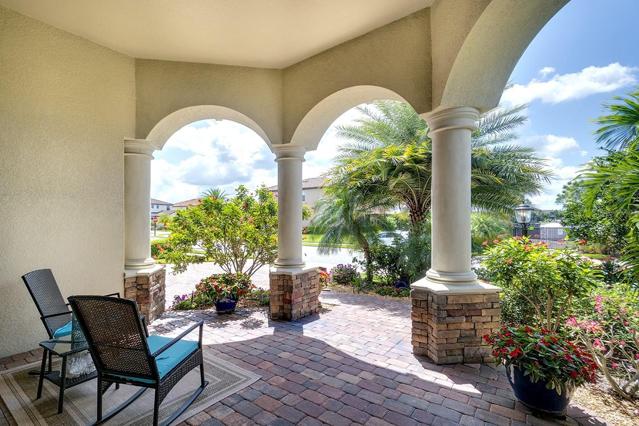 Surrounded by Lush Landscaping with Custom Lighting
