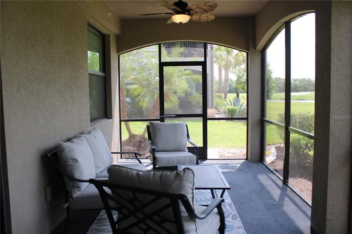 Screened in lanai over looking the green belt, lake and golf course