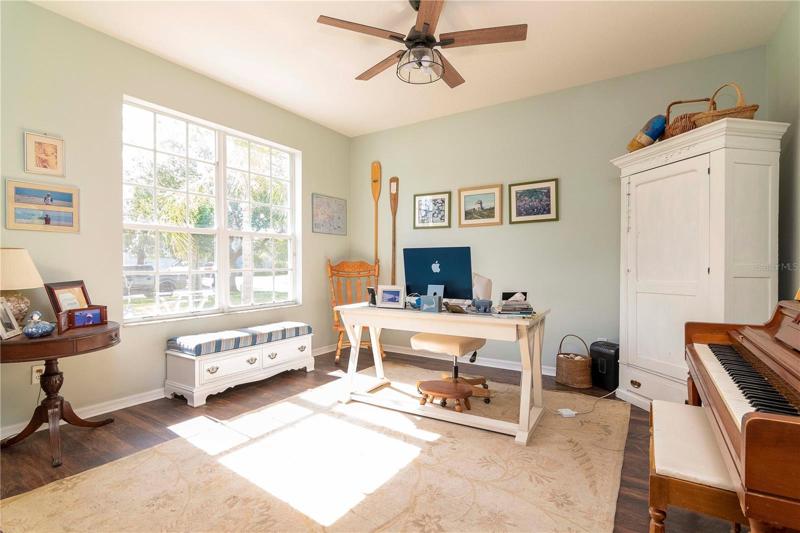 Formal living room - can add French door for office space