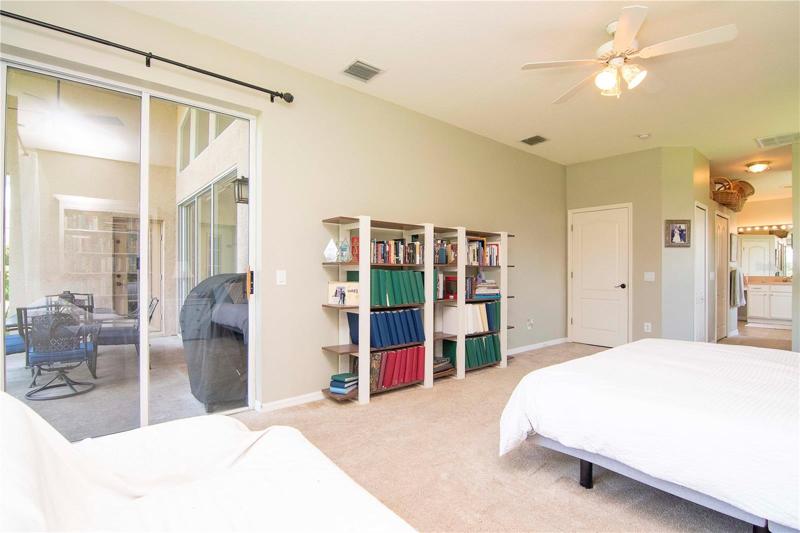Master bedroom with sliders to patio