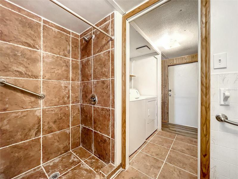 Beautifully tiled and updated walk-in shower