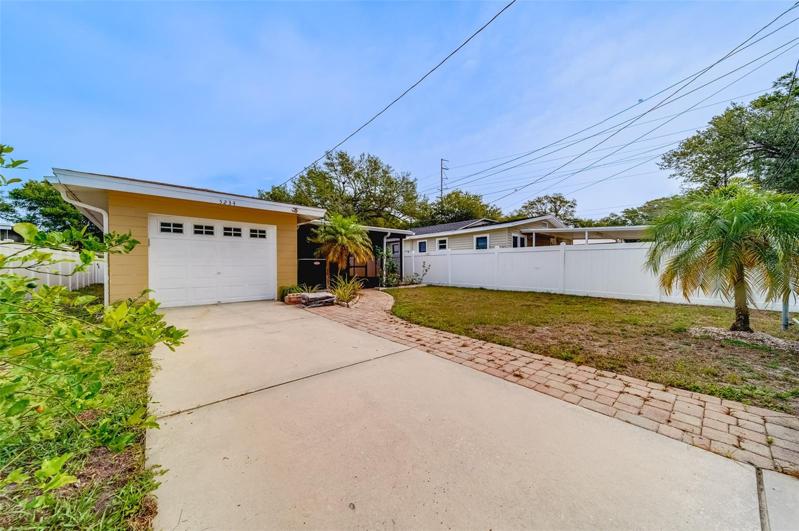 Alley Access to garage and additional Driveway
