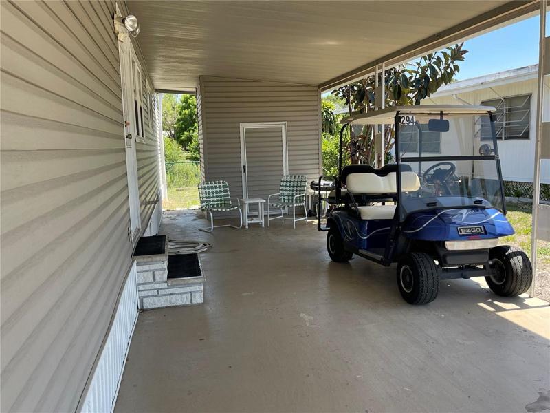 Carport w/ Shed