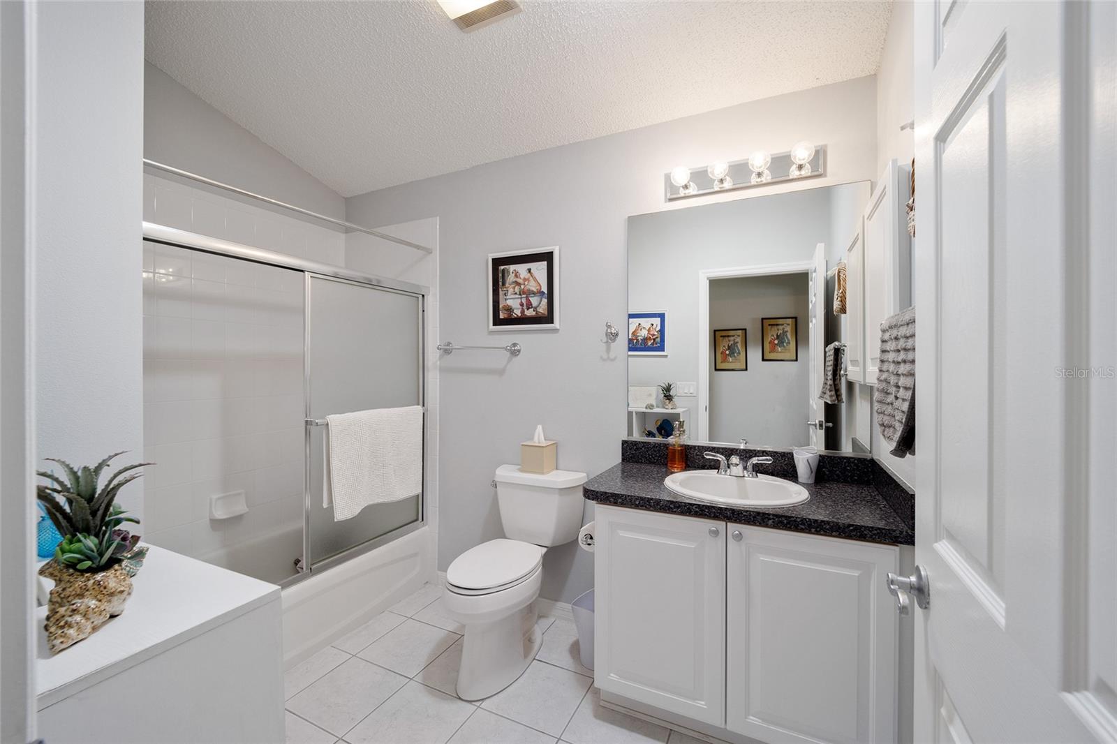 Guest Bath with Tile Flooring