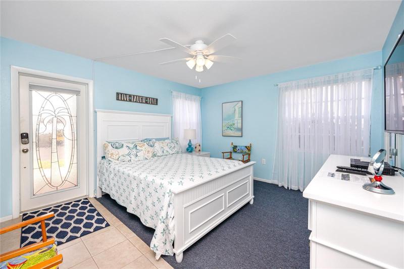Master bedroom with the backdoor entrance.