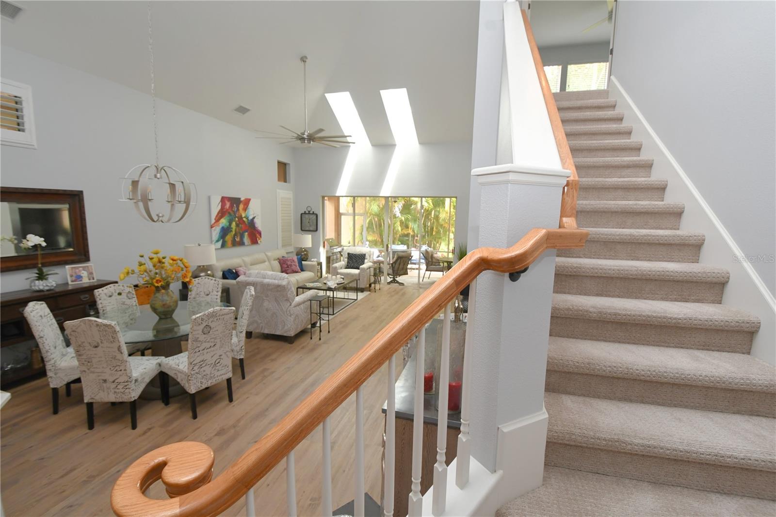 The second floor features two bedrooms, a full bath and extra storage.