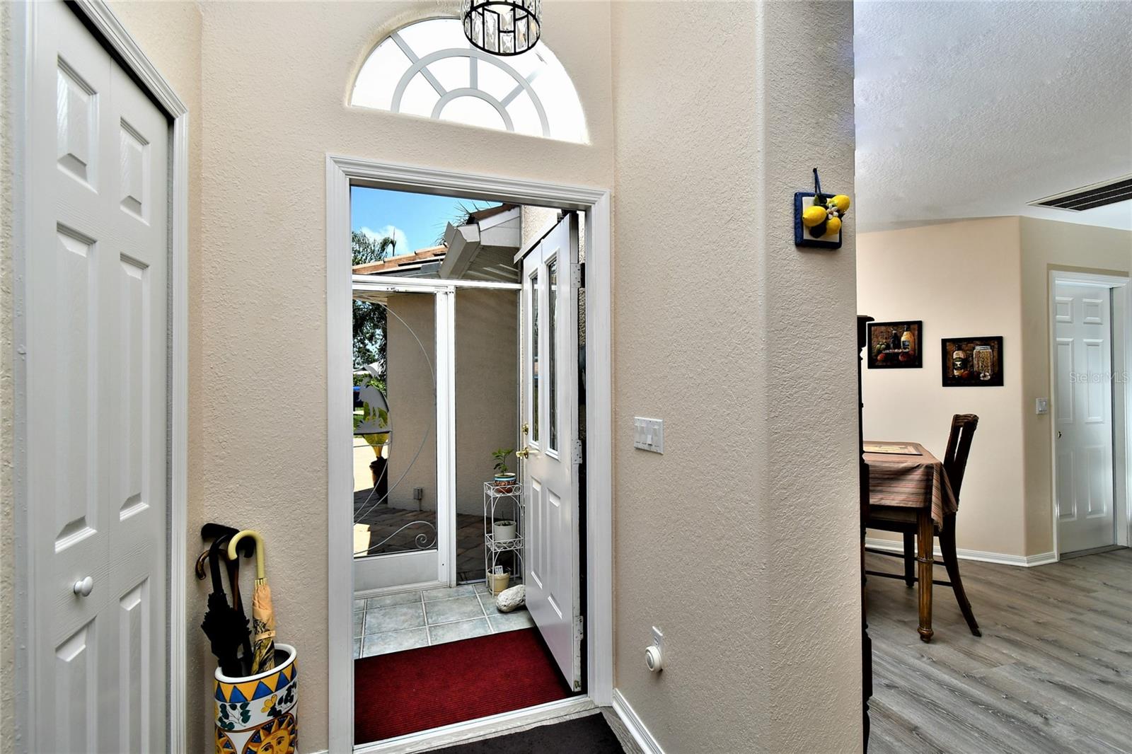 Foyer Entry with Coat Closet, Nook Dining is shown to the right