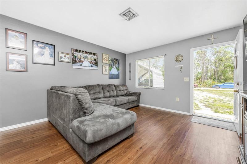Liivng room has laminate flooring for easy maintenance!