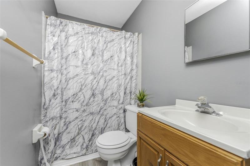 Master bathroom has  a step in shower