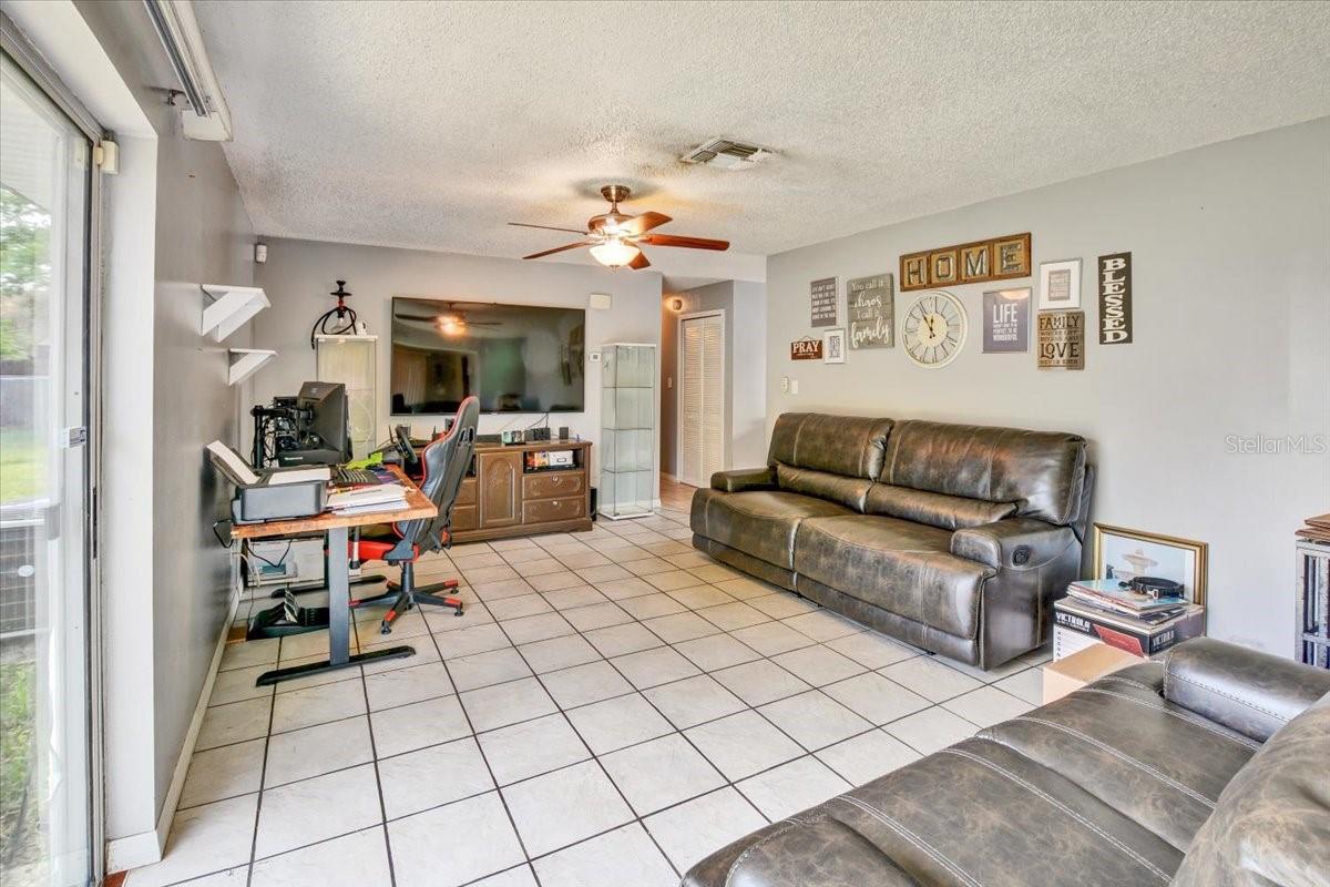 Large Family Room with Ceramic tile