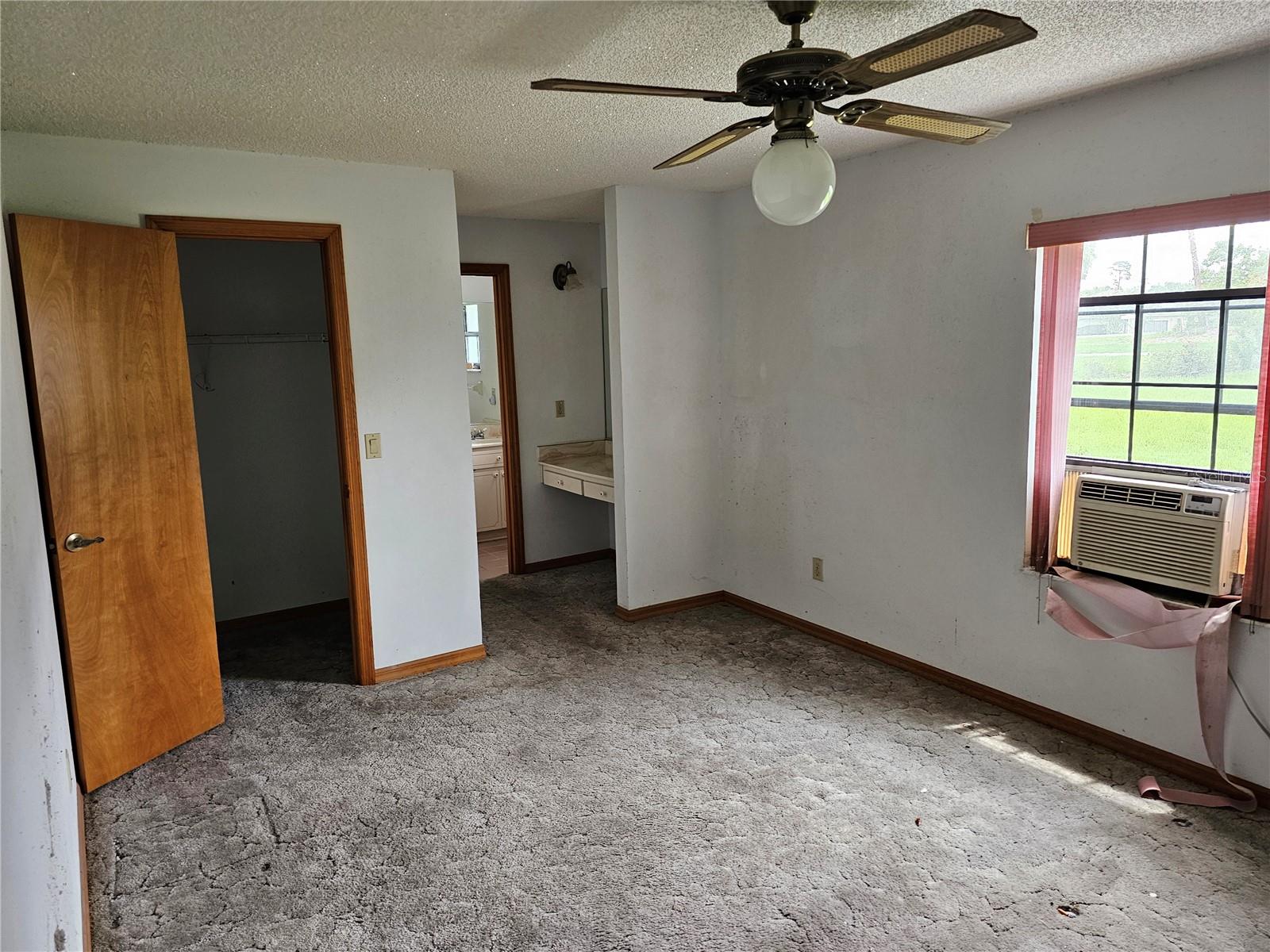 Family room looking to slider door to dining room