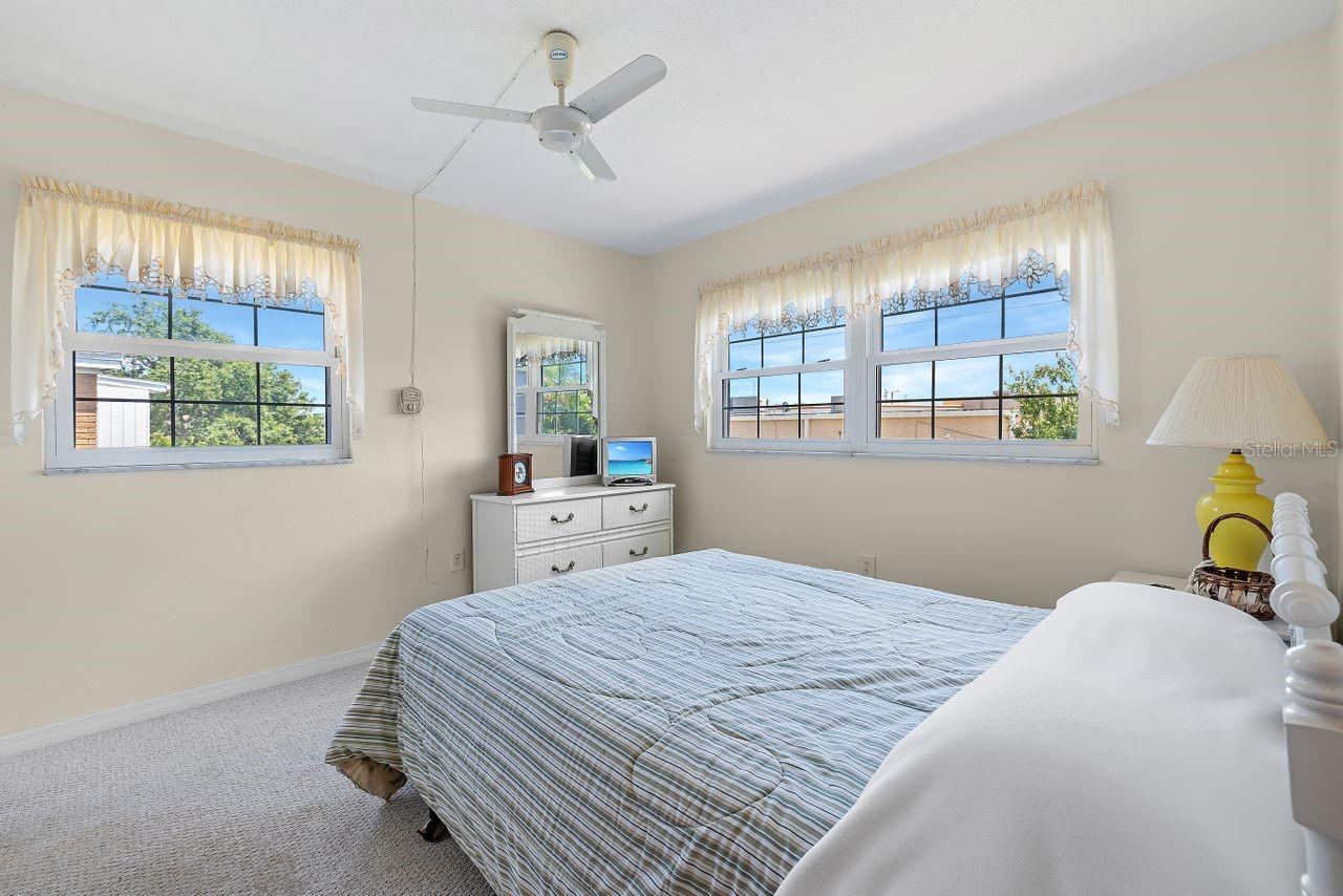 second bedroom with walk in closet