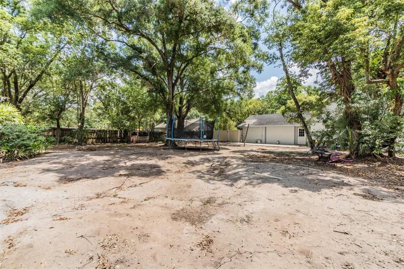 Huge Fenced in Back Yard!  Great for a Pool or Storage!