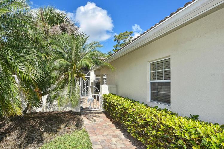 Walkway to patio and front entry