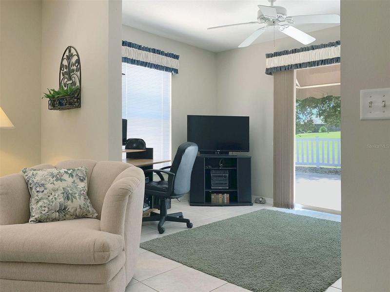 LIVING ROOM W/SMALL DEN
