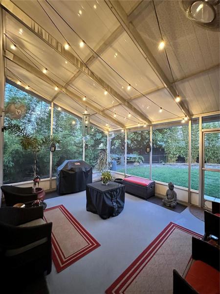 Screened in lanai with vaulted metal roof