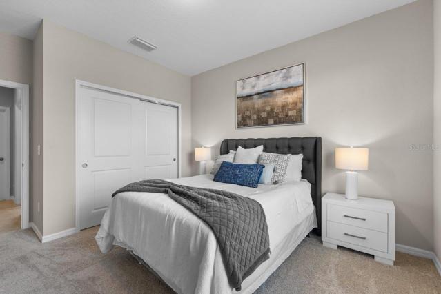 Guest bedroom off of the main entryway