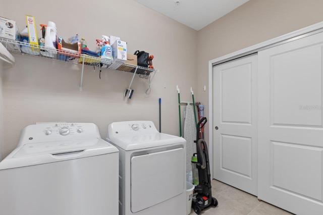 Spacious laundry room off of the entryway